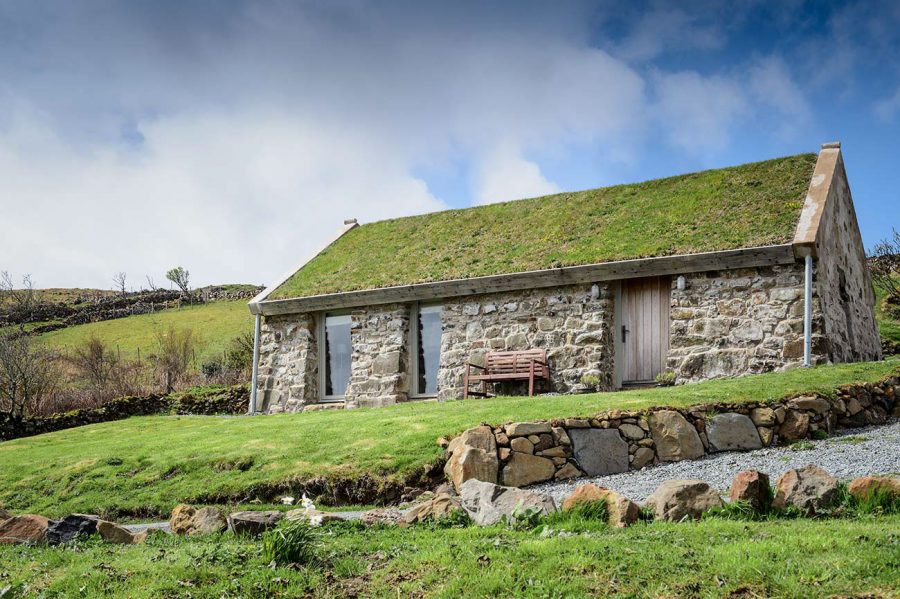 Blackhouse Cottage. A renovated Hebridean Blackhouse with a traditional turf roof.