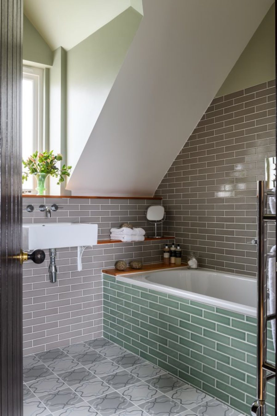 Croft House cottage. Fired Earth designer bathroom with rain-head shower and large bath.