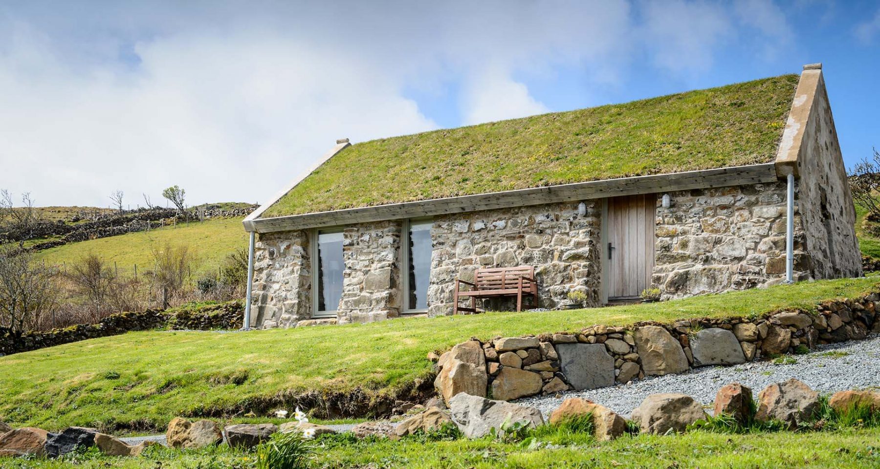 Blackhouse Cottage. A renovated Hebridean Blackhouse with a traditional turf roof.